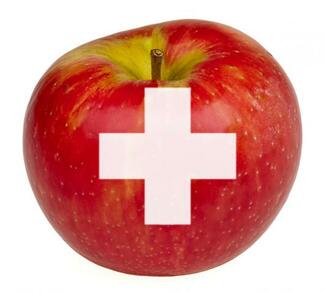Mad som medicin - ernæring er vigtigt i forhold til dit helbred. Mad som medicin. Billede af et æble med et hvidt medicinkors.
